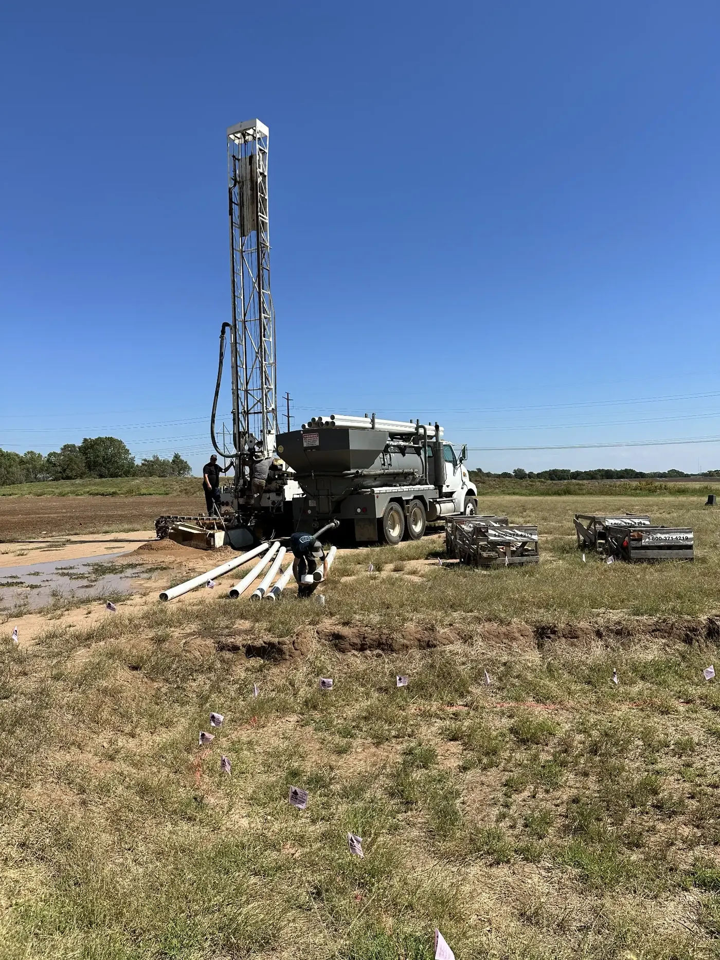 Chase Drilling LLC drilling rig at a Wichita, KS residential property drilling a water well to supply a geothermal heating and cooling HVAC system